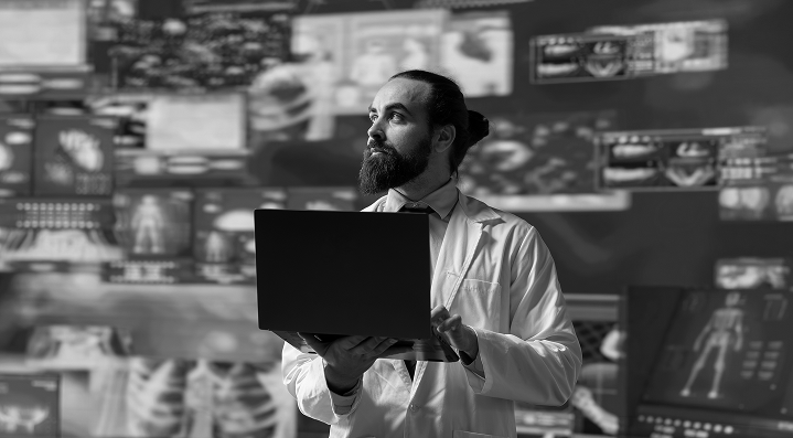 Professional holding laptop